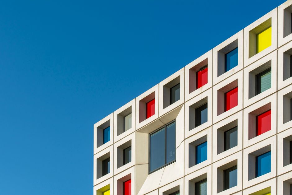 Vibrant geometric facade of a modern building in Den Haag, Netherlands.